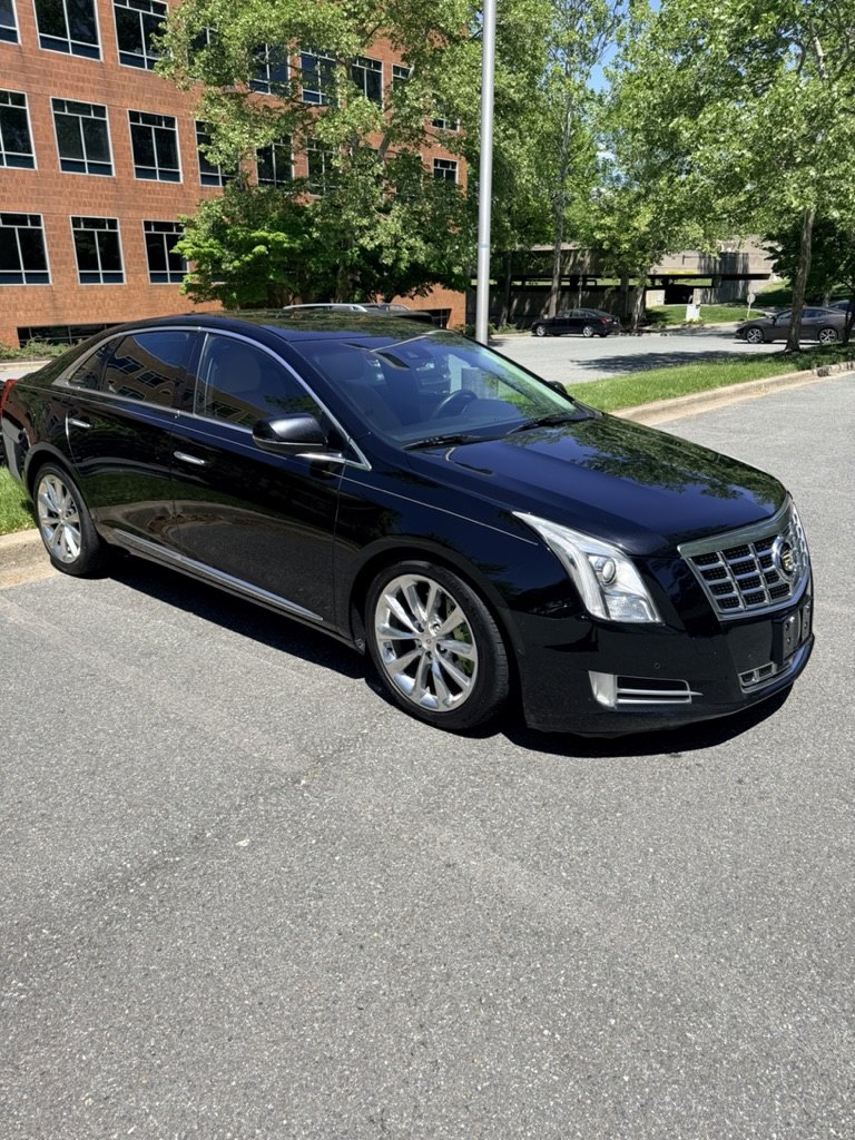 Black Cadillac XTS after a full detail